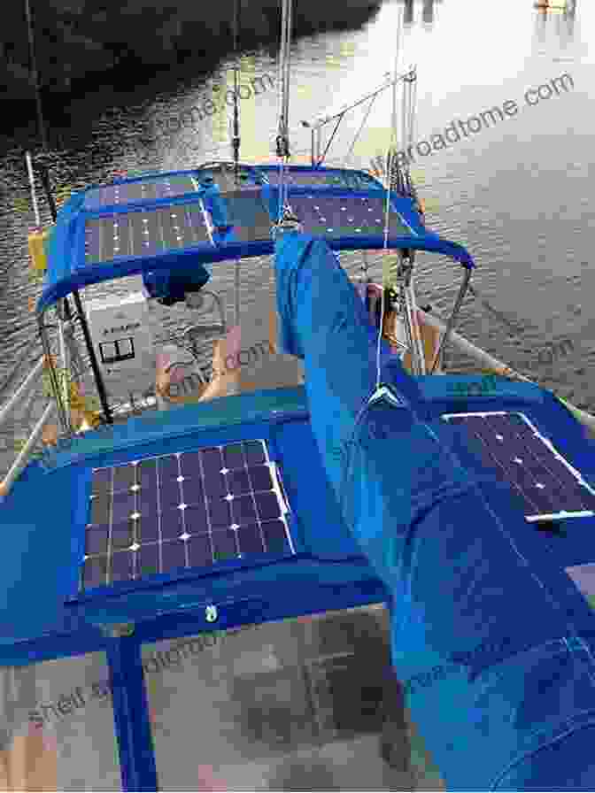 A Sailboat Equipped With Solar Panels And A Water Filtration System, Showcasing Eco Friendly Practices At Sea How To Sail Around The World: Advice And Ideas For Voyaging Under Sail