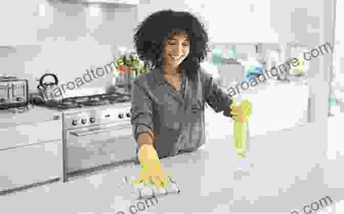 A Woman Cleaning A Kitchen Counter How The Queen Cleans Everything: Handy Advice For A Clean House Cleaner Laundry A