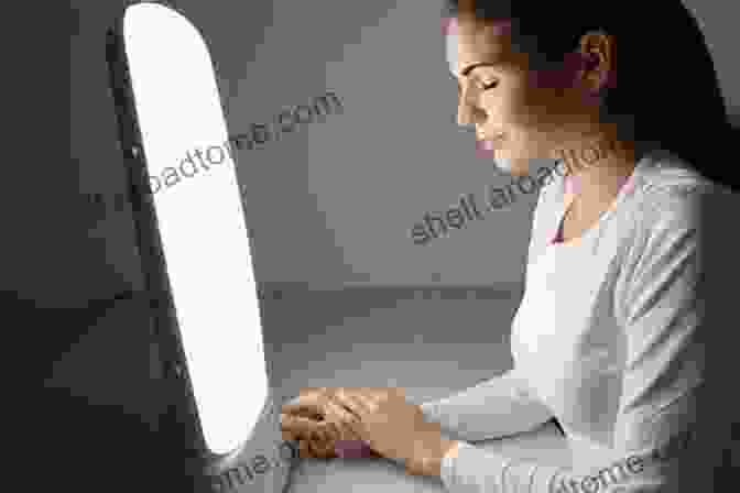 Image Of A Person Sitting In Front Of A Light Therapy Lamp Depression Treatment Naturally Depression Self Help: 21 Non Medical Depression Cures To Stay Happy For Life (depression Cure Postpartum Depression Depression Self Help Depression Free)