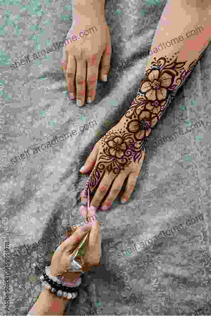 Mauritanian Henna Artist Applying Henna Design On A Woman's Hand Mauritania: Mauritanian Henna Designs Grace Divine